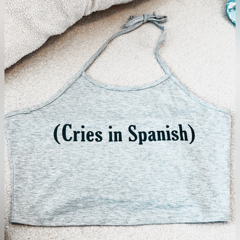 (Cries in Spanish) halter top